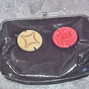 Elegant vintage Marni Black Clutch with Decorative Accent.  Hard to find piece